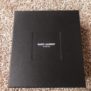 Saint Laurent “Tribute” camouflage leather sandals